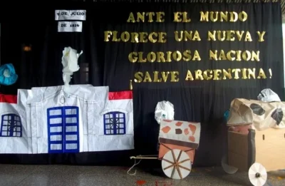 Escenario para 9 de julio con casa de tucuman y carreta