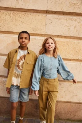 Tonos tierra tendencia moda infantil verano 2025 Argentina