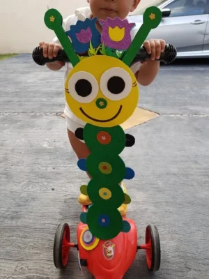 Adornar triciclo primavera de gusano